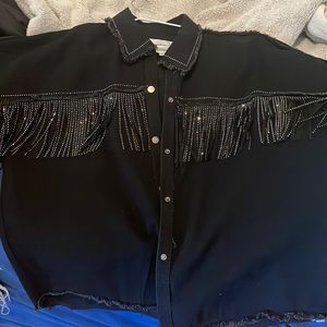 Very cute. Says XL but fits S,M oversized.